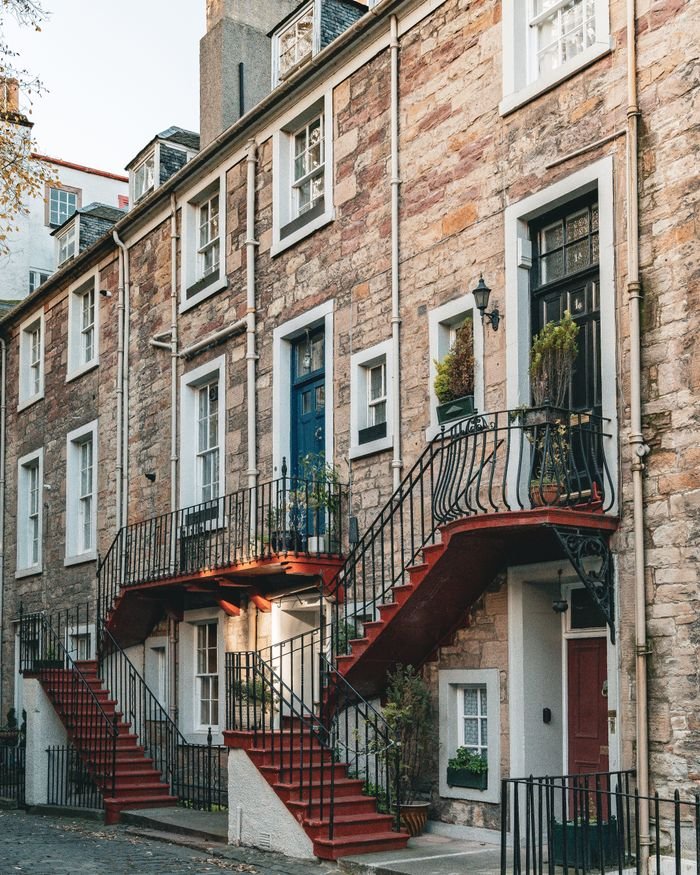 Discover the picturesque stone facades and traditional charm of Edinburgh's historic residential streets.
